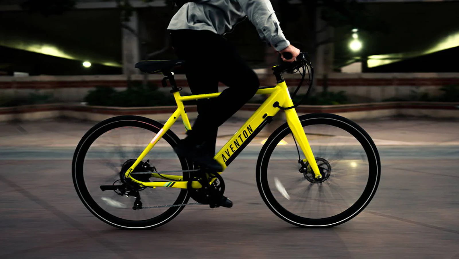 An image of someone riding an Aventon bike at a fast pace